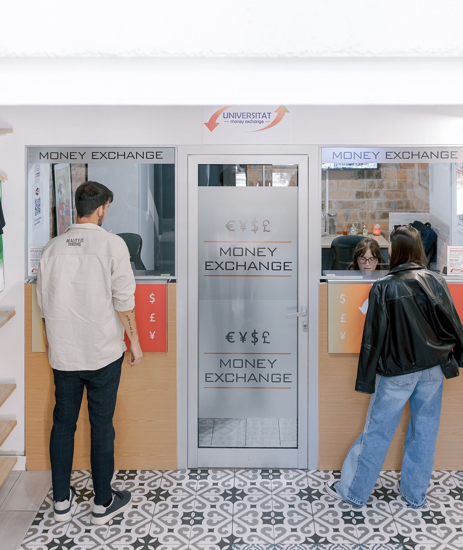 Cartel tienda Universitat